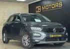 1° Main Garantie 12 mois Volkswagen T-Roc 1.0 L TSI 115 ch Business / Apple CarPlay / Android auto / Climatisation automatique bi-zone / Caméra de recul / Assistance de maintien de trajectoire